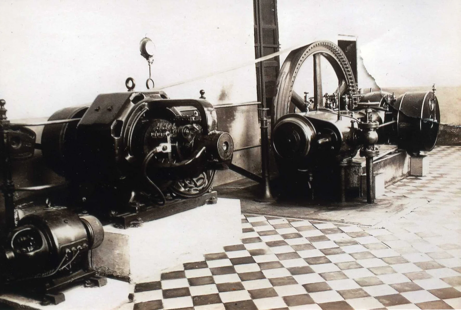 A black and white picture shows an excerpt of the history of electricity generation.
